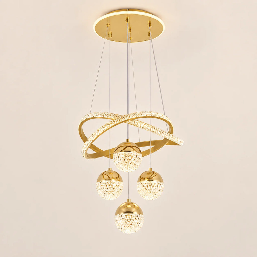 Goldene LED-Pendelleuchte mit verschlungenen LED-Ringen