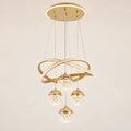 Goldene LED-Pendelleuchte mit hängenden Lichtkugeln