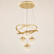 Goldene LED-Pendelleuchte mit hängenden Lichtkugeln