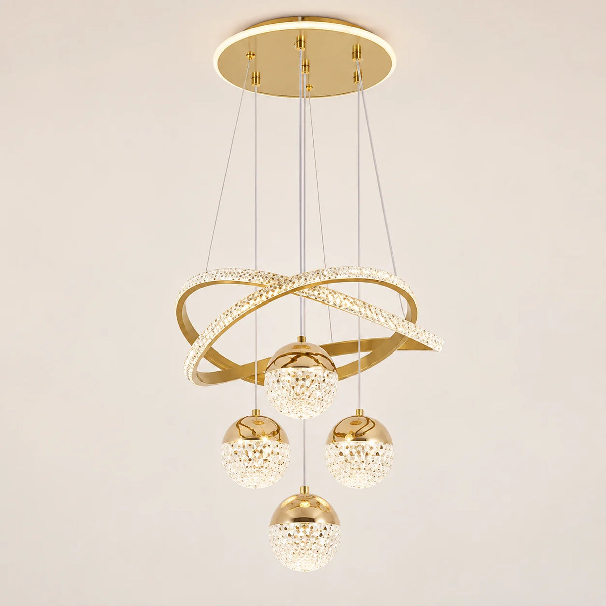 Goldene LED-Pendelleuchte mit hängenden Lichtkugeln